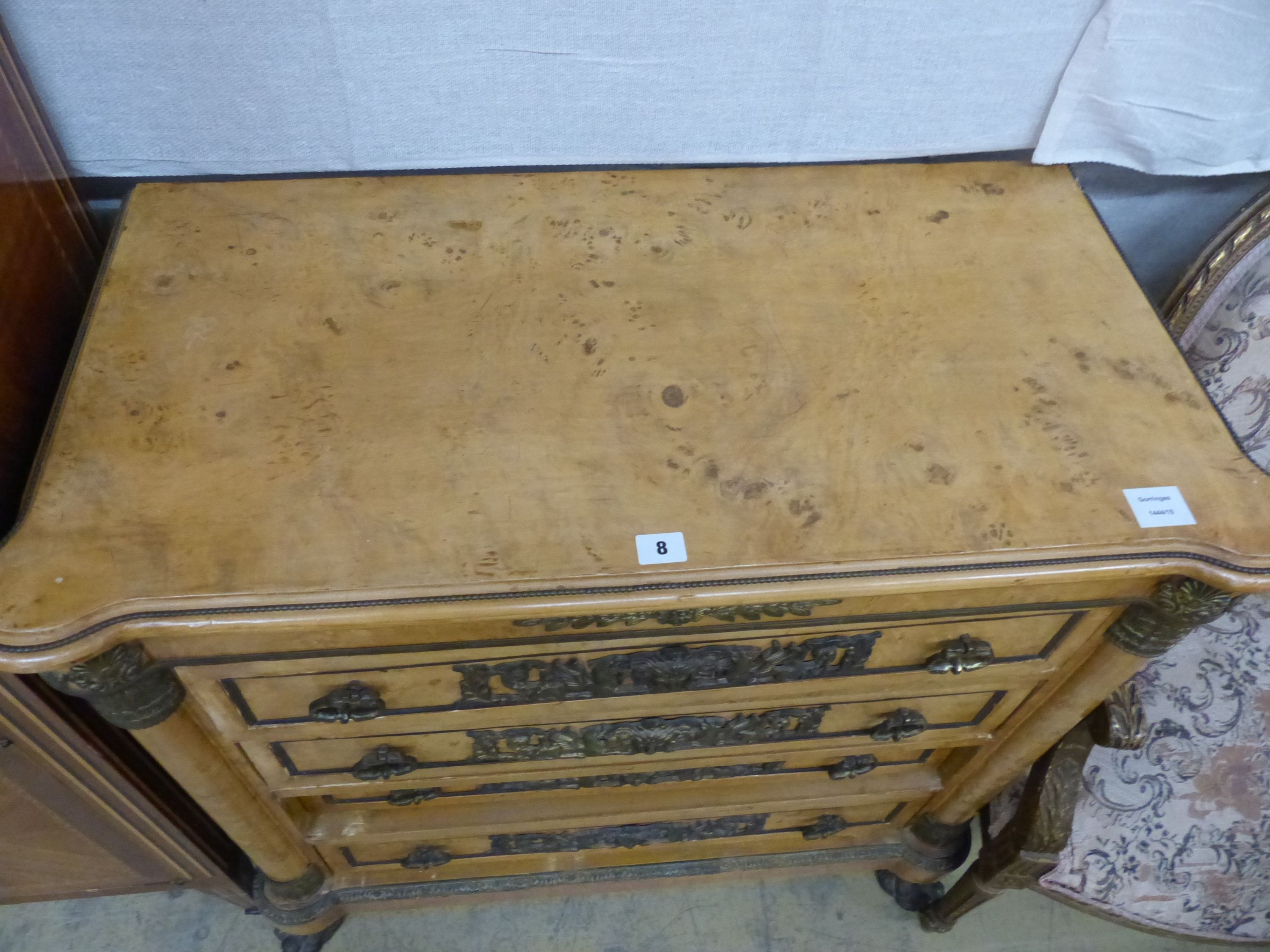 A French Empire style ormolu mounted walnut chest of drawers, W.90cm D.45cm H.89cm